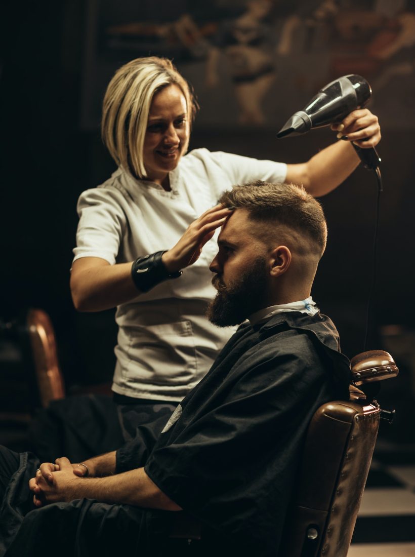 young-bearded-man-getting-haircut-by-hairdresser.jpg young-bearded-man-getting-haircut-by-hairdresser.jpg